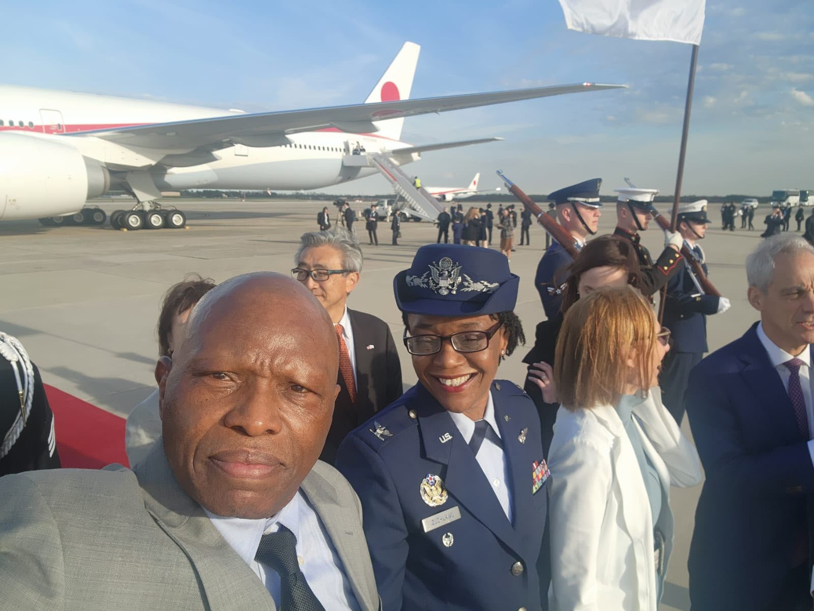 Arrival ceremony near an aircraft