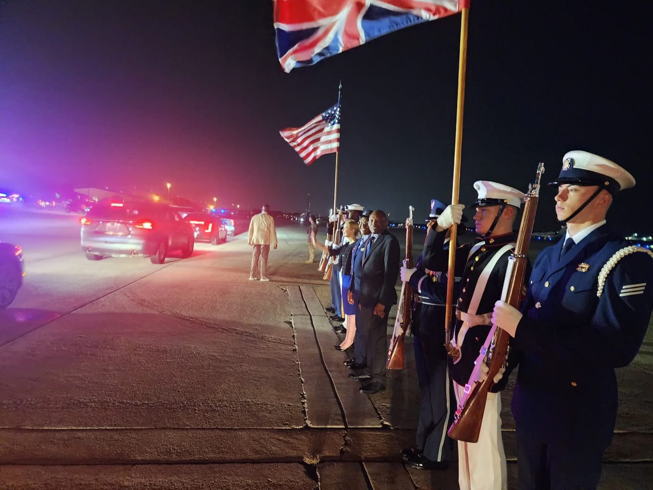 An evening ceremony with flags